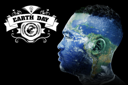 Earth Day Graphic against earth overlay on faceの写真素材