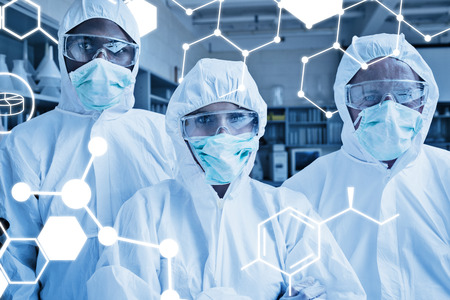 Science graphic against team of three chemists