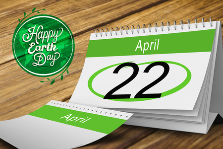 April calendar against wooden backgroundの写真素材