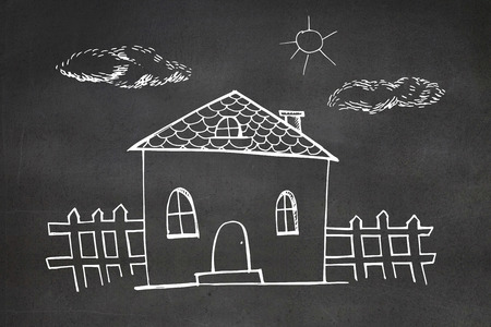 Hand drawn house against black wallの写真素材