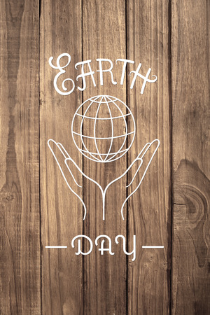 Earth Day Graphic against overhead of wooden planksの写真素材