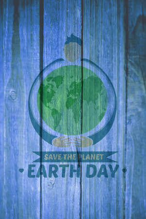 Earth Day Graphic against wooden backgroundの写真素材