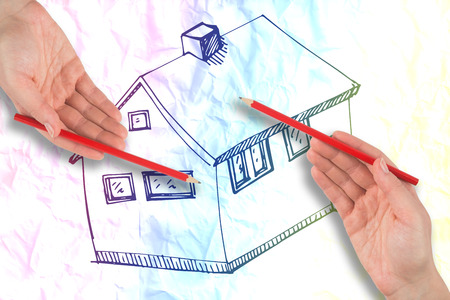 Hand holding red pencil  against crumpled white pageの写真素材