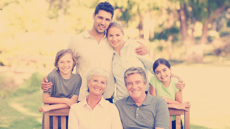 Family in the park in yellow tonesの写真素材