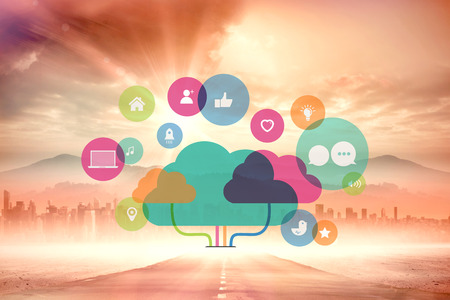 Apps and cloud computing concept against sun shining over road and cityの写真素材