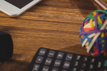 Overhead shot of students desk with accessoriesの写真素材