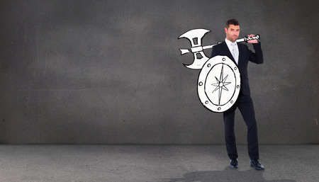 Corporate warrior against grey roomの写真素材