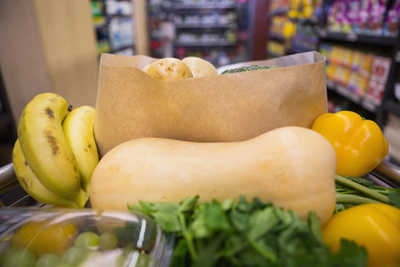 A trolley with healthy food at supermarket
