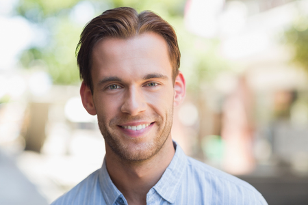 Portrait of a handsome smiling man looking at the camera Portrait of a handsome smiling man looking at the camera