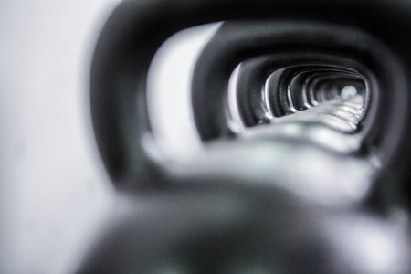 Close up view of kettlebells in a row in crossfit gymの写真素材