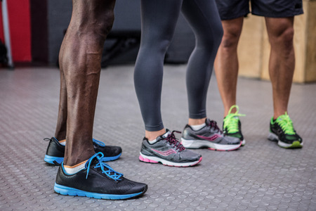 Young people standing in the crossfit gymの写真素材
