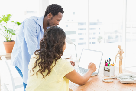 Teamwork using laptop in the officeの写真素材