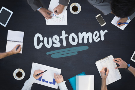 The word customer and business meeting against blackboardの写真素材