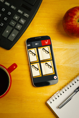 Website design against overhead of smartphone with calculatorの写真素材