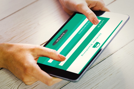 Woman using tablet pc  against online banking