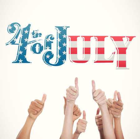 Hands up and thumbs raised against white background with vignetteの写真素材