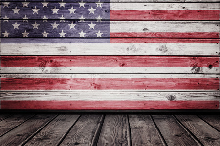 Usa national flag against dark wooden roomの写真素材
