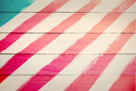 Independence day graphic against painted blue wooden planksの写真素材