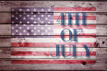 Independence day graphic against digitally generated grey wooden planksの写真素材