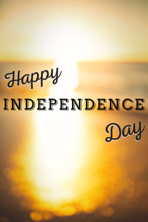 Independence day graphic against sunset of a beautiful dayの写真素材