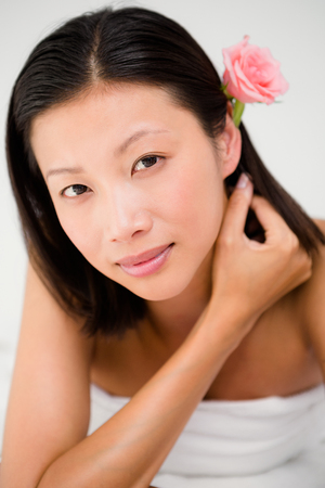 Relaxed woman on the massage table at the health spaの写真素材
