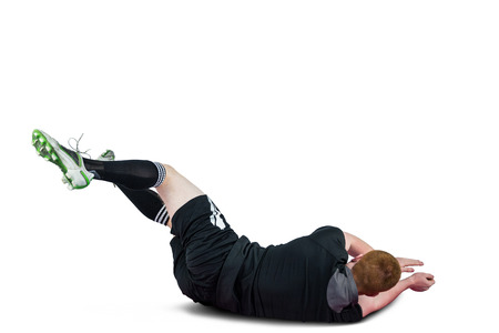 A determined rugby player scoring a tryの写真素材