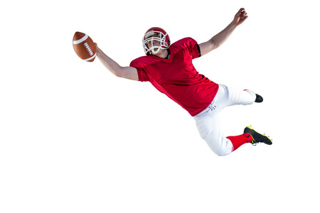 American football player scoring a touchdown on a white background