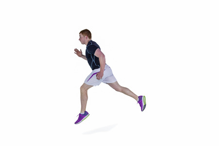 Muscular rugby player running on a white backgroundの写真素材