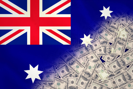 Pile of dollars against australian flagの写真素材