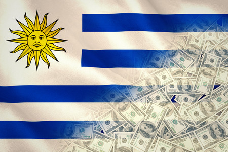 Pile of dollars against digitally generated uruguay national flagの写真素材