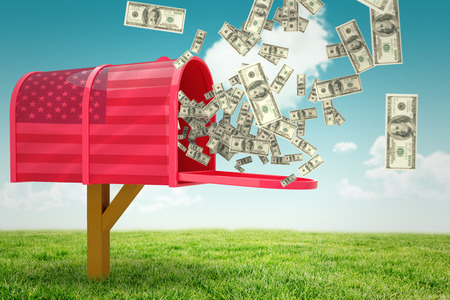 Falling dollars against digitally generated american national flagの写真素材