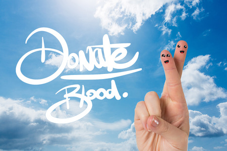 Blood donation against blue skyの写真素材