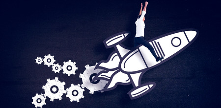 Cheering businessman against blackの写真素材