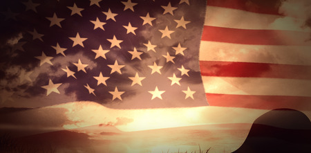 United states of america flag against sunrise over grassの写真素材