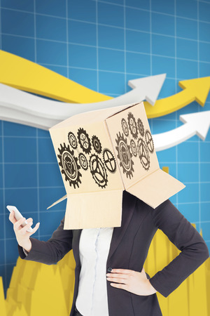 Anonymous businesswoman with her hands up against digital arrows with a graphの写真素材