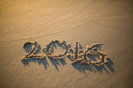 love written on the beach at the sunsetの写真素材