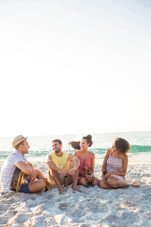 Group of friends having fun at the beachの写真素材