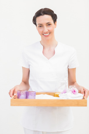 Beautiful woman wear a tray at spa centerの写真素材