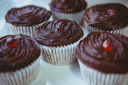 Muffins in a bakery on a sunny day