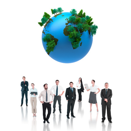 Business team against earth with forestの写真素材