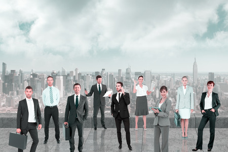 Business team against balcony overlooking cityの写真素材