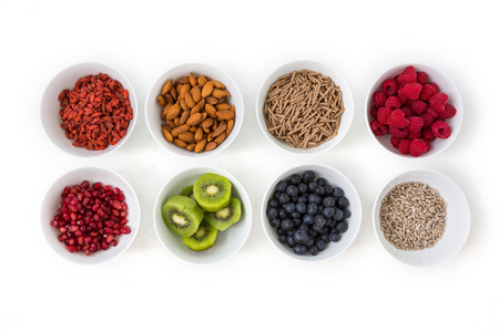 Bowls of healthy food on white backgroundの写真素材