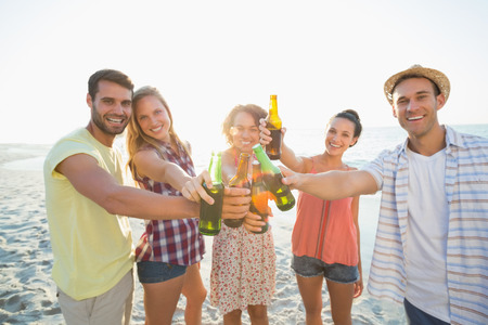 group of friends having fun at the beach