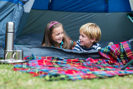 Happy child in the park together on sunny dayの写真素材