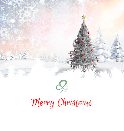 Composite image of christmas card against christmas tree in snowy landscapeの写真素材