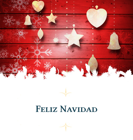 Christmas greeting card against christmas decorations over woodの写真素材