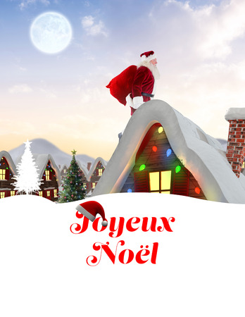 Santa delivery presents to village against red santa hat hanging on posterの写真素材