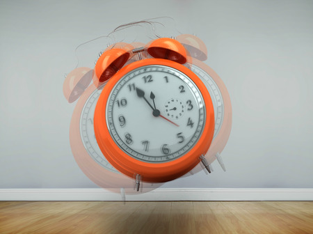 Alarm clock counting down to twelve against room with wooden floor