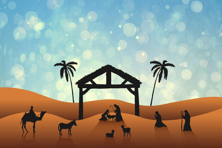 Nativity scene against blue abstract light spot designの写真素材