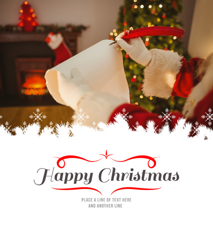 Father christmas writing with a quill against borderの写真素材